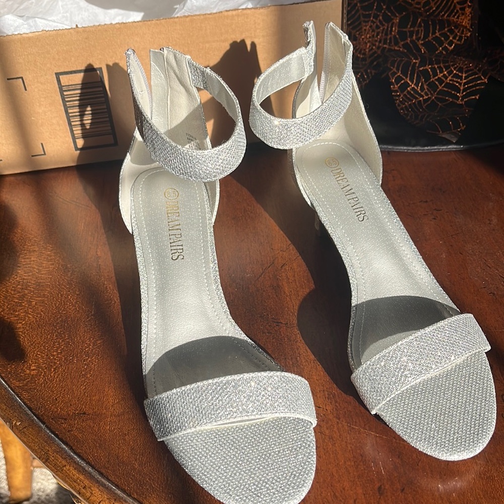 silver sparkly 2” kitten heel and 0.25” platform heel
